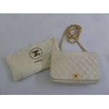 Chanel white leather quilted ladies handbag to include certificate no. 1475677 and dust cover, A/F