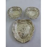 Two silver pierced heart shaped bonbon dishes and a heart shaped silver pin tray