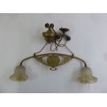 A Victorian brass two branch pendulum ceiling light with counter weight balance and glass shades