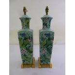 A pair of Chinese style rectangular table lamps on square brass bases