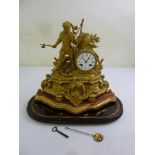 A French Ormolu mantle clock, two train movement , circular enamel dial with Roman numerals, to