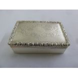 A late Victorian rectangular silver table snuff box, engine turned sides and hinged cover with