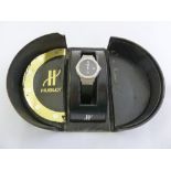 Hublot ladies wristwatch with steel face and rubber strap in original case