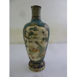 A Chinese style ceramic decorative lamp base decorated with flowers, leaves and trees