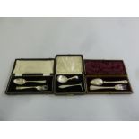 Three cased sets of silver flatware to include Victorian spoon and fork, pusher and spoon and