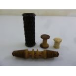 Four treen bobbins of various forms