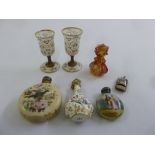 A quantity of period porcelain, glass and enamel scent bottles, a rare enamelled whistle and two