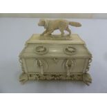 French 19th century Dieppe jewellery box of rectangular form with carved animals to the sides on