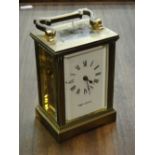 A French brass cased carriage clock retailed by Mappin & Webb.