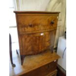 A Georgian mahogany bow front commode.