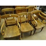 A set of 6 19th century mahogany and panel seated dining chairs with turned legs.