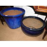 2 blue glazed ceramic planters.