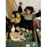 2 monkey figures,