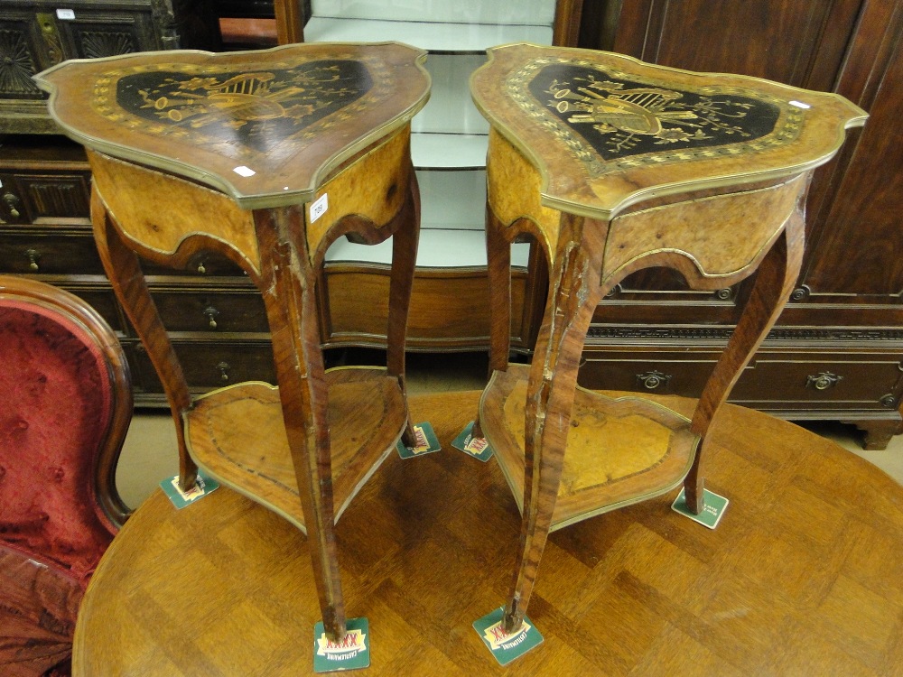 Pair of continental Kingwood and walnut occasional tables with brass decoration.