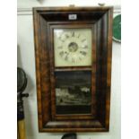 A 19th century American mahogany cased wall clock by E N Welch of Forestville, USA.
