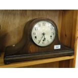 An oak 3-train mantel clock.