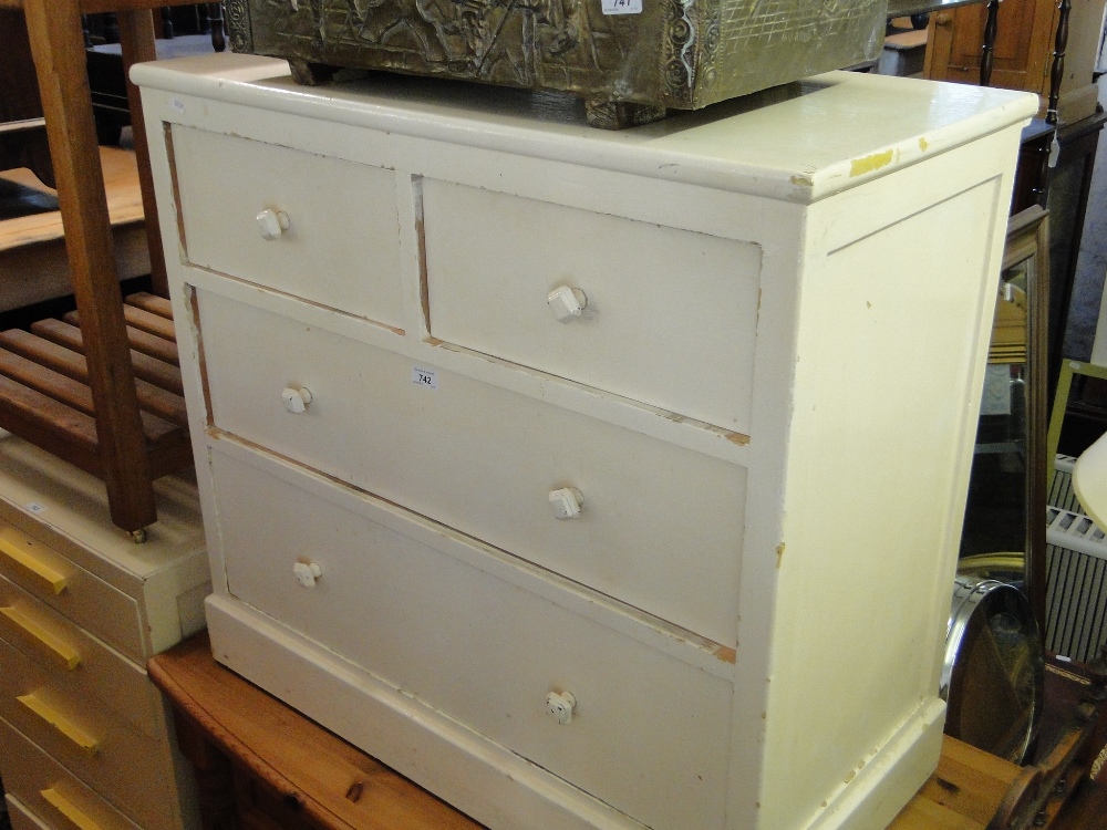 A painted pine 4-drawer chest.