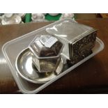 A small silver dish with inset coin, white metal box, silver mounted bottle, etc.