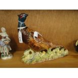 A Beswick pheasant no. 1225.