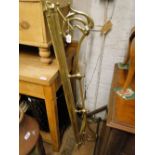 An Art Nouveau style brass fender.