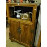 A Chinese rosewood 2-door cabinet.