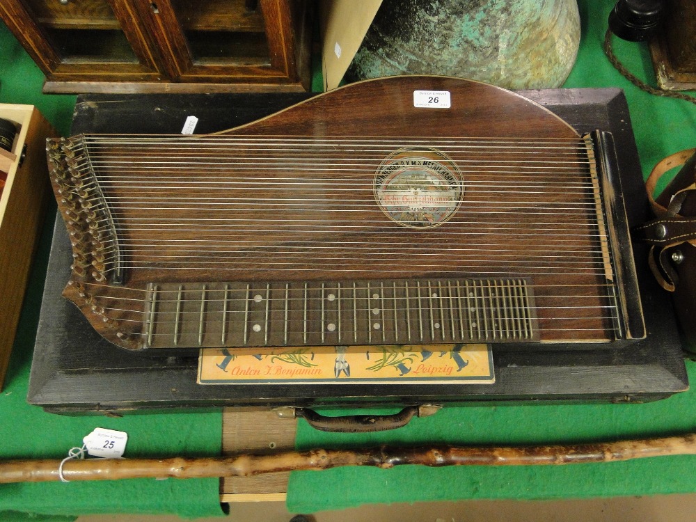 An early 20th century German harp zither, original wooden case.