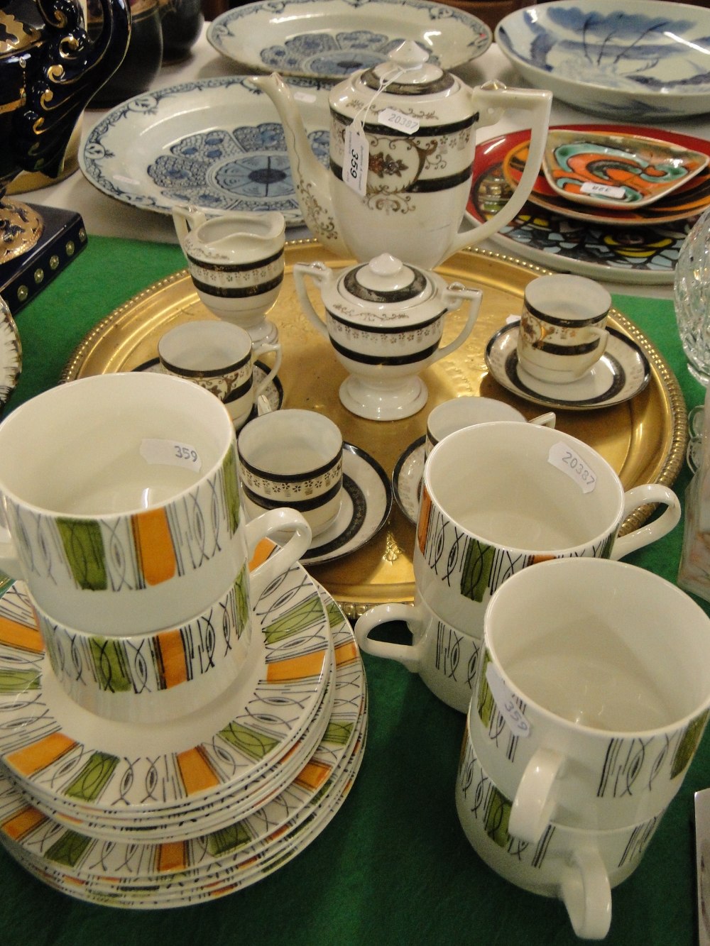A Japanese coffee set for 4-people and an engraved brass tray, and 6 cups and saucers.