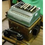 An early oak cased wall hanging telephone and a Plus adding machine, (2).