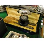 A French silver handled serving items, cased, and a silver trophy on stand.