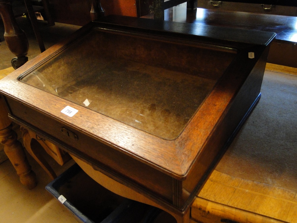 An oak framed table top jewellery display cabinet.