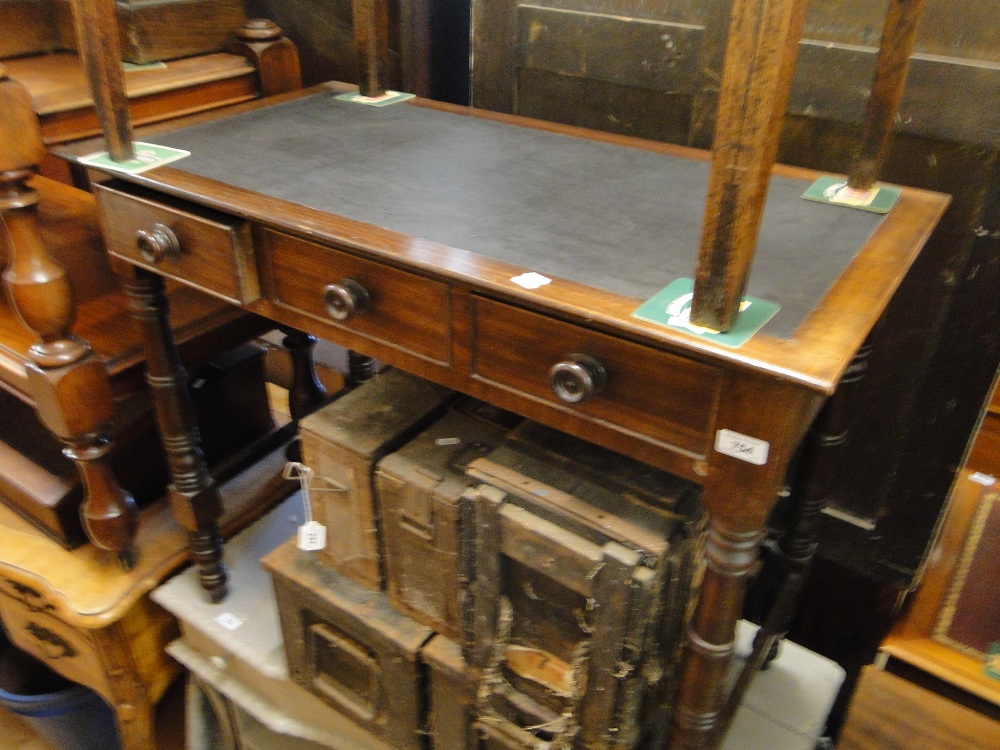 A 19th century mahogany side table with 2 frieze drawers on turned legs.