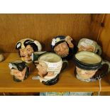 7 miniature Royal Doulton Character jugs.