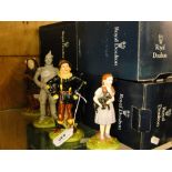 Royal Doulton 4-piece Wizard of Oz set, comprising Dorothy, Scarecrow, Tin Man and the Lion, boxed.