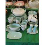 A Poole 2-tone part dinner service including tureens and meat plate.