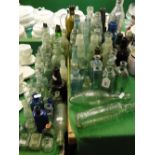 Large collection of old bottles including poison, ink, cod bottles and soda bottles.