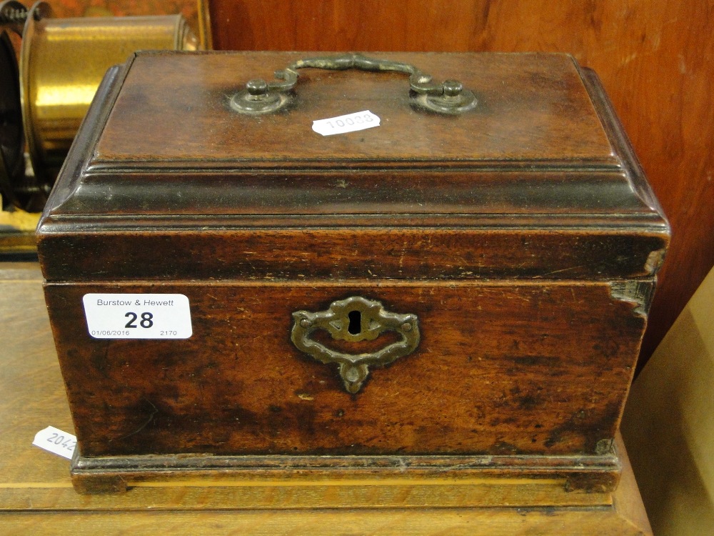 A George III mahogany tea caddy.