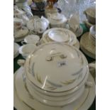 A Royal Worcester "Harvest Ring" dinner service with 2 tureens, meat plates, and matching teaset.