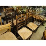 Set of 6 oak ladder back dining chairs.