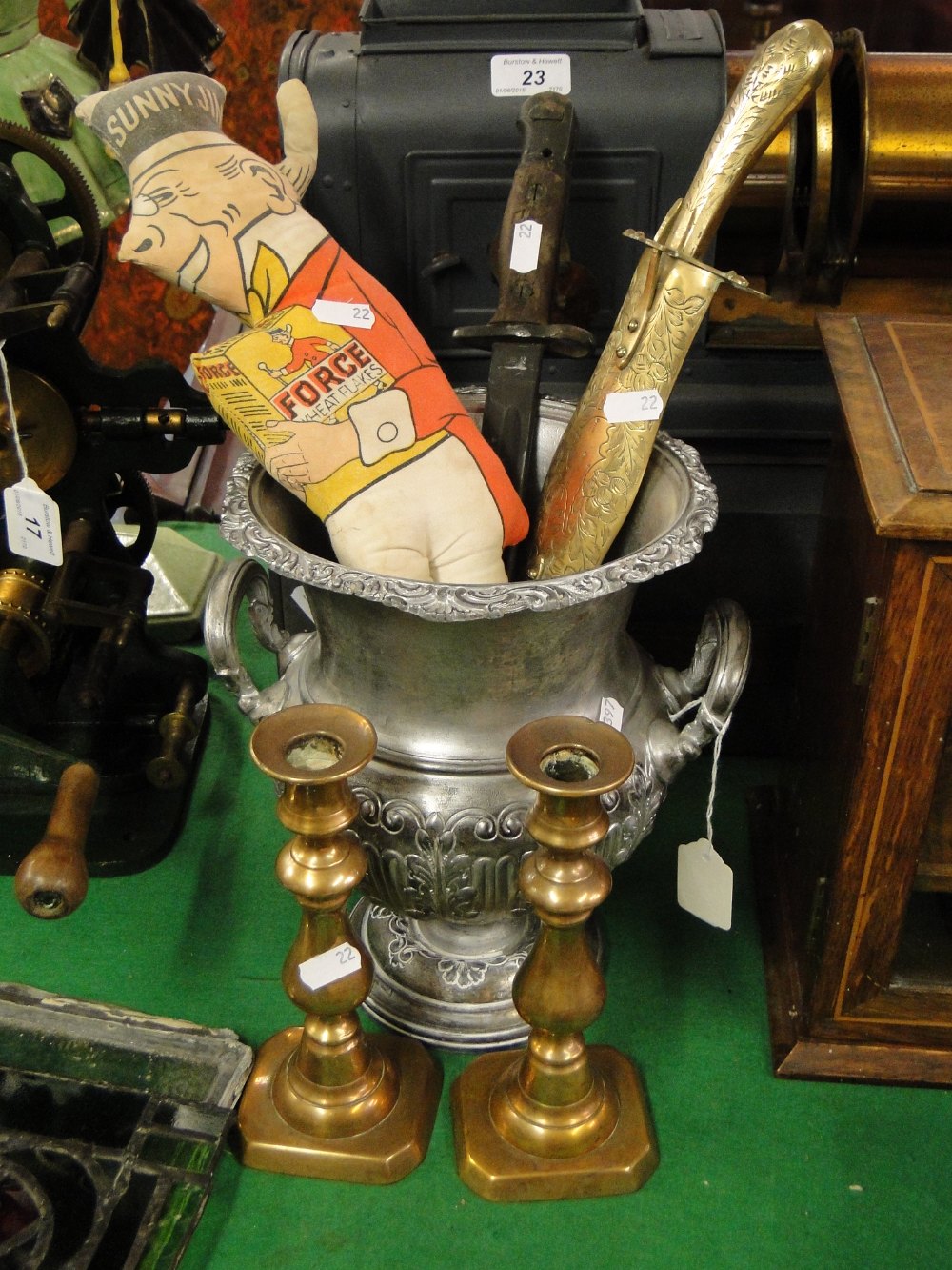 A painted metal wine cooler, pair of Victorian brass candlesticks, bayonet, etc.