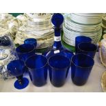 A Bristol Blue sherry decanter, 6 tumblers and 2 matching tots.