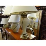 2 pairs of table lamps and 3 mirrors.