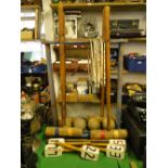 A child's croquet set with stand and markers, etc.