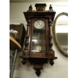 A 19th century walnut cased Vienna regulator wall clock.