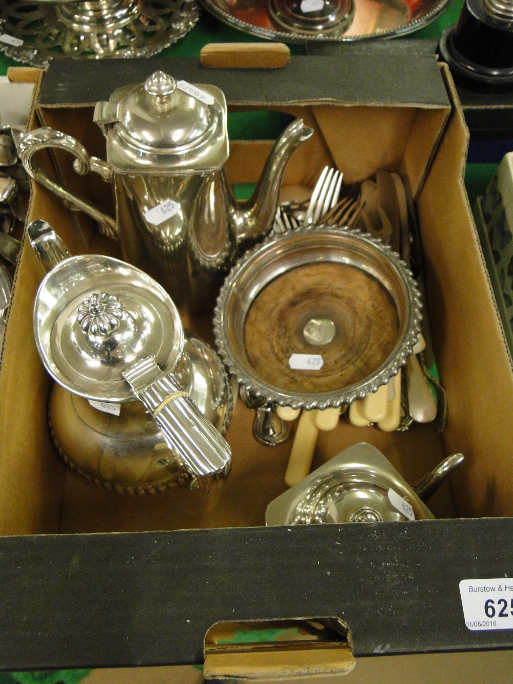 Silver plated coffee pots, wine coaster, cutlery.