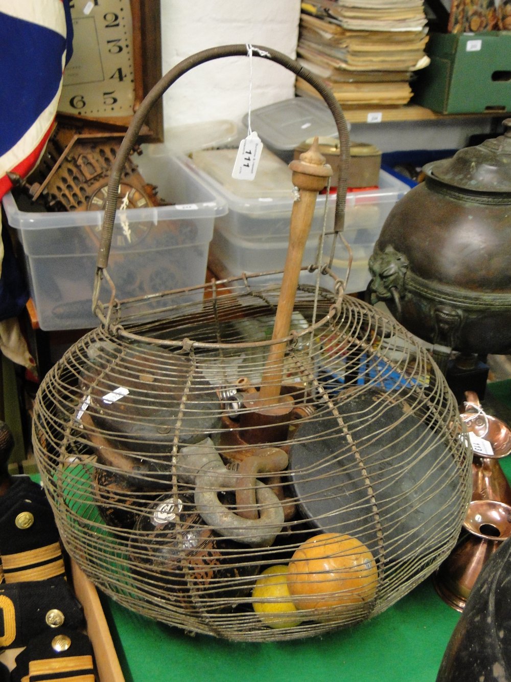 Wire basket containing bowls/bar skittles, pulley etc.