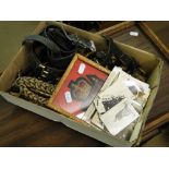 Box containing military badges, belts, cord sashes, photos, etc.