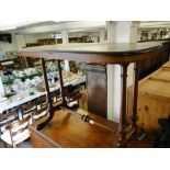 A Victorian figured walnut stretcher table.