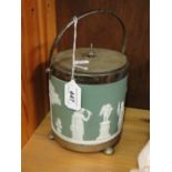 A Wedgwood green Jasperware biscuit barrel with plated mounts.