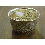 An Edwardian silver embossed sugar bowl, London 1901, 2.4 oz.