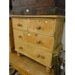 An Antique pine 4-drawer chest.